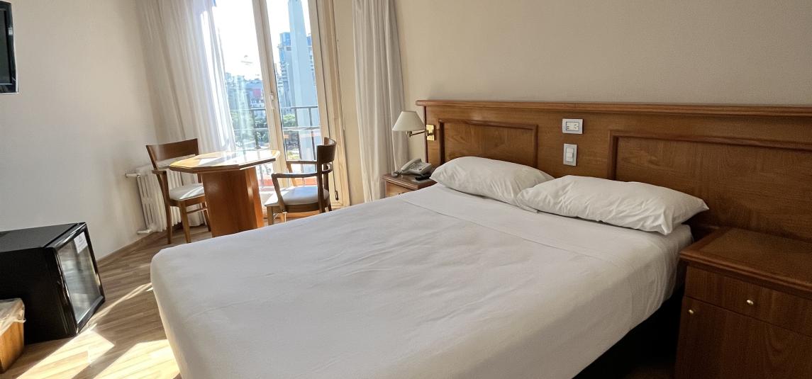 Standard room with double bed and city view