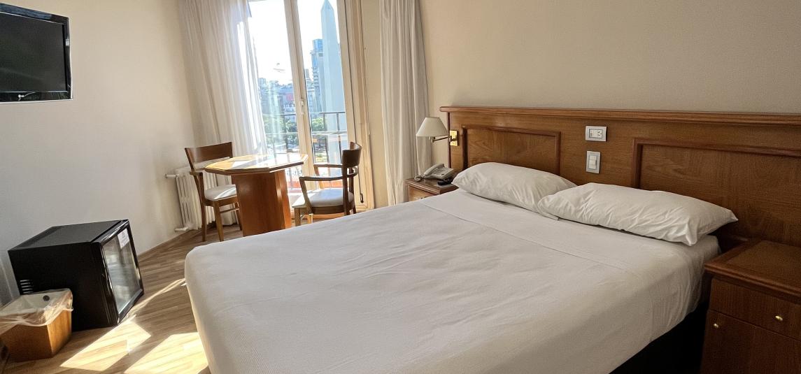 Standard room with double bed and city view