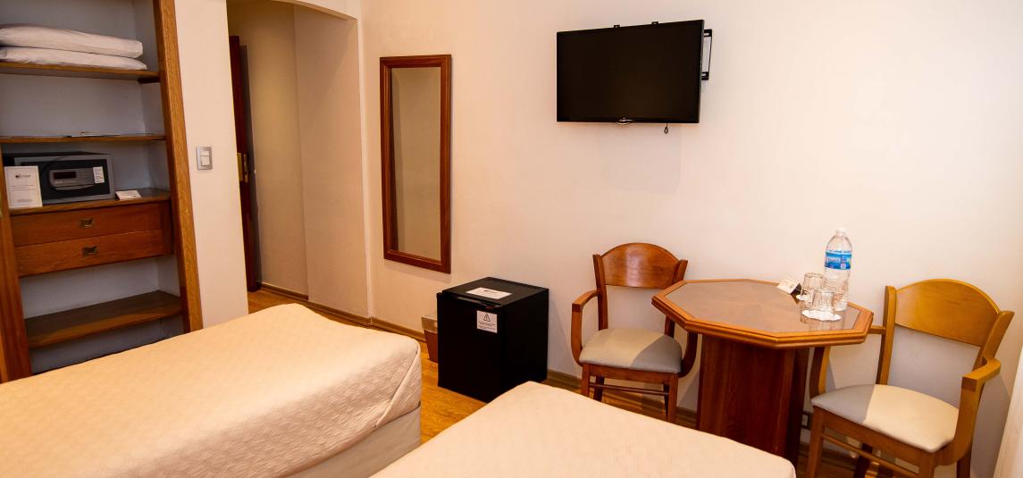 Standard room with two single beds and interior view