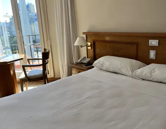 Standard room with double bed and city view