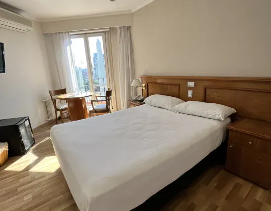 Standard room with double bed and city view