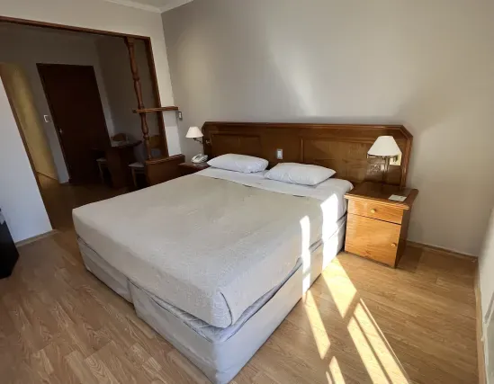 Standard room with double bed and interior views